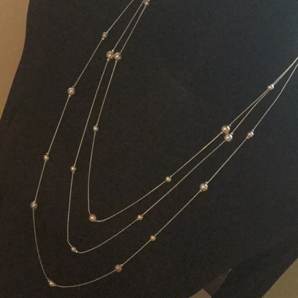 Three-strand silvertone necklace